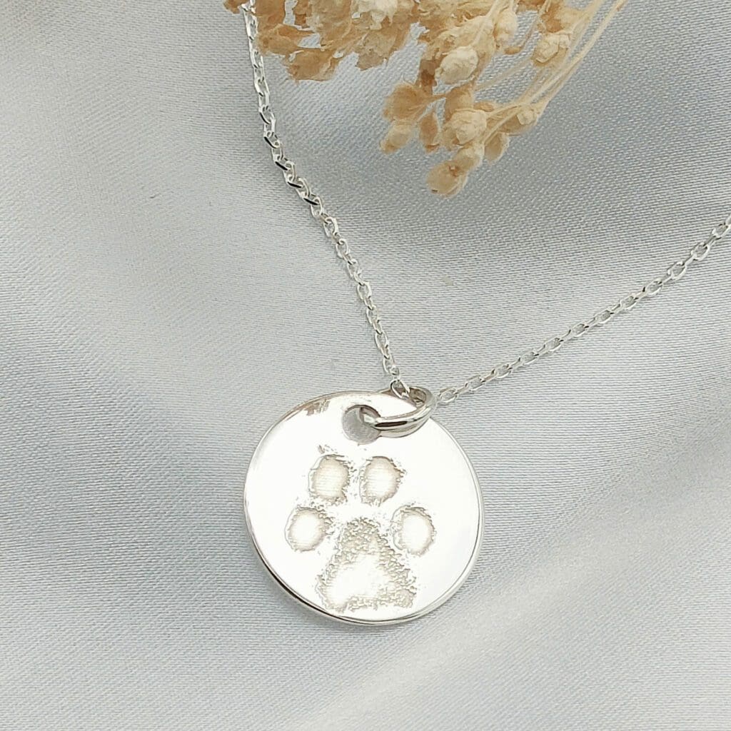 empreinte chien pendentif